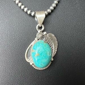 Sterling Silver Turquoise & Feather Pendant